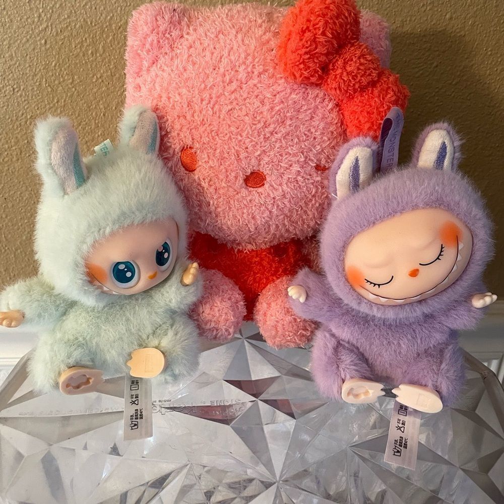 The Monsters Pop Mart Pink and Purple Figures & Pink Hello Kitty Plush